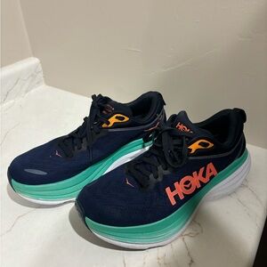 Hoka Bondi 8 navy running shoes with teal and coral features
